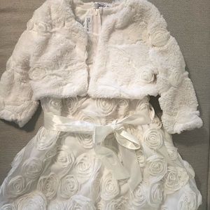 Beautiful creamy white girls dress. Perfect for upcoming parties or holidays.